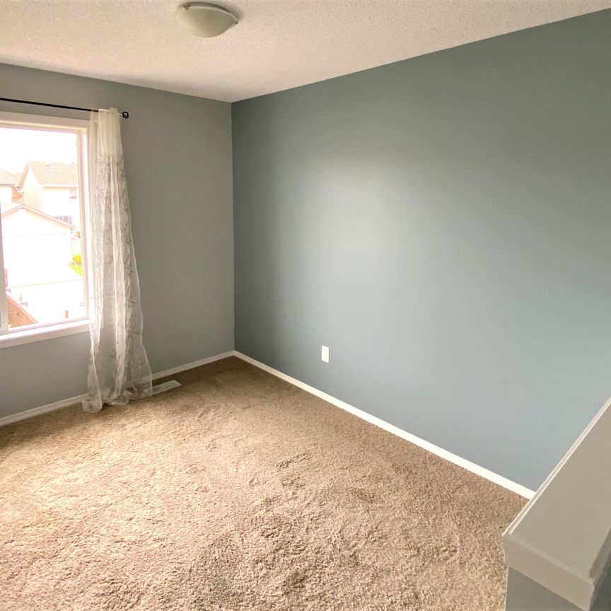 The Hamptons 2 Bed + Den Duplex | Double Garage - Photo 1