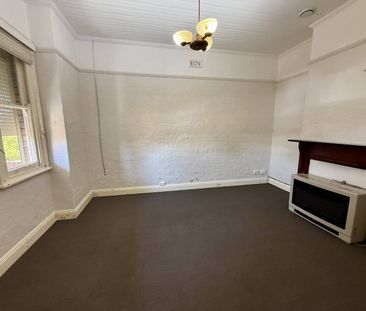 Charming One‑Bedroom Home with Modern Comforts and Convenient Features - Photo 1