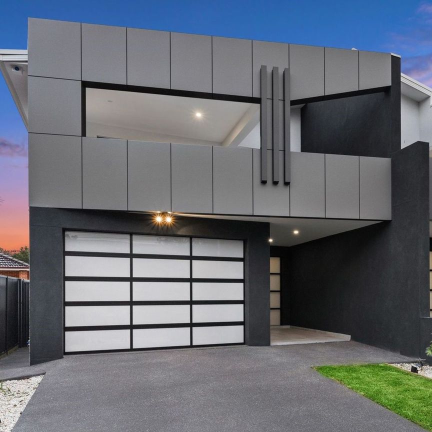 CONTEMPORARY DUPLEX IN PRIME LOCATION - Photo 1