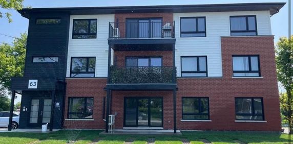 Beaux 4 1/2 NEUFS, quartier tranquille, dès maintenant; Rue Armand - Photo 2