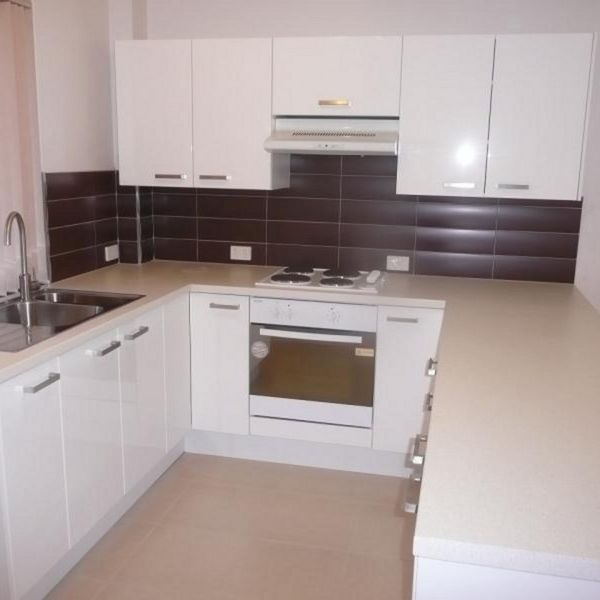 RENOVATED DELIGHT WITH AIR CON, DRYER & PRIVATE COURTYARD - Photo 1