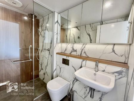 Beautifully Renovated Two Bedroom Unit with rear deck overlooking the backyard - Photo 5