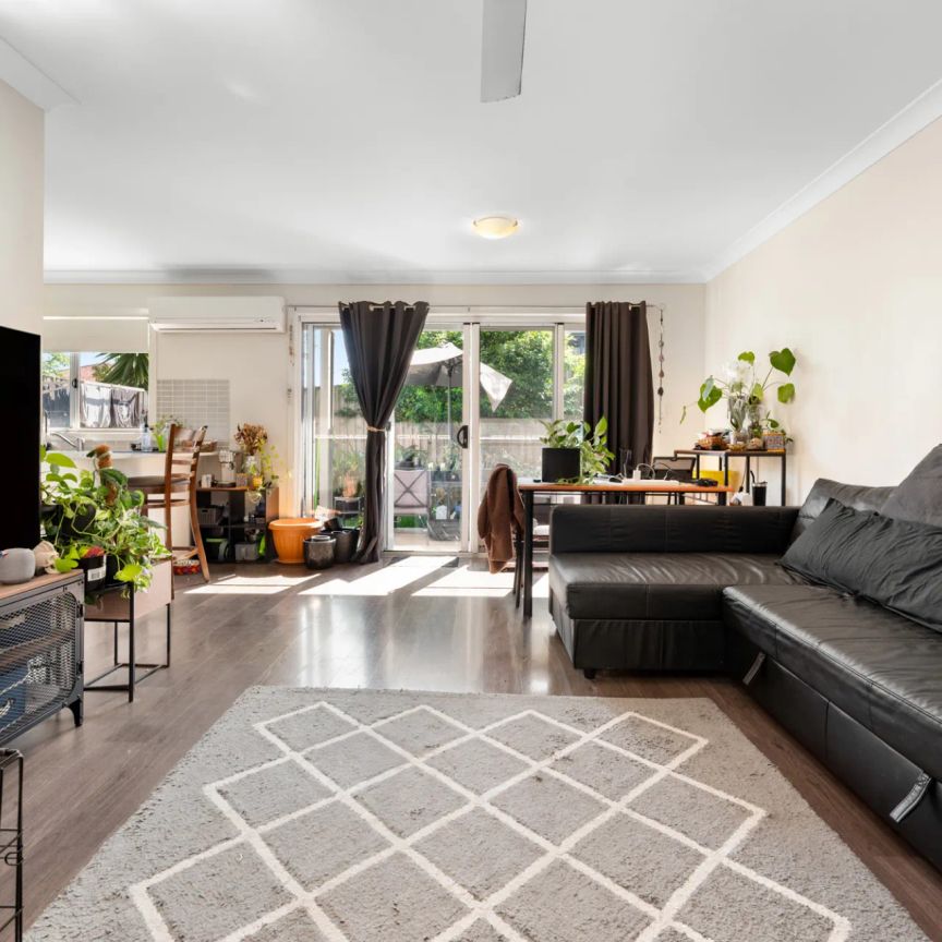 Private Family Home in Boutique Complex with Low-Maintenance Living - Photo 1