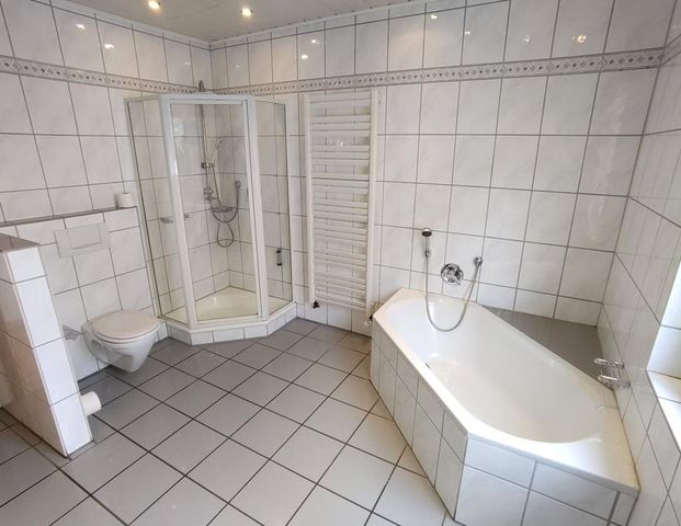 Helle 4-Zi. EG-Wohnung mit großer Terrasse, OS-Haste - Foto 1