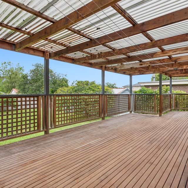 Neat Brick Home with Large Deck and Big Backyard - Photo 1