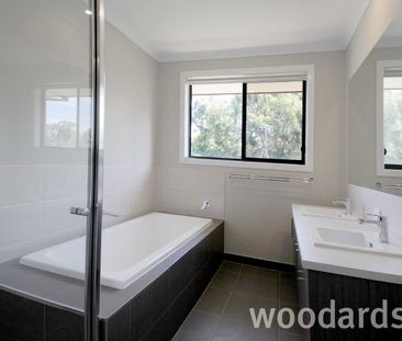 IMPRESSIVE TOWNHOUSE IN MOUNT WAVERLEY SCHOOL ZONE - Photo 1