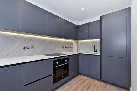 A second floor furnished apartment with south facing private balcony in the sought after Horlicks Artesian House development by Berkeley Homes. - Photo 2