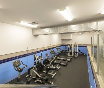 Stylish 2BR Central Apt with Gym - Photo 3