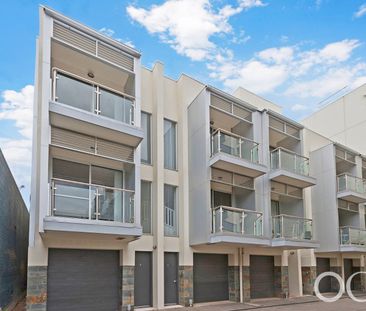 Open the Door to City Serenity with a Private Balcony - Photo 1