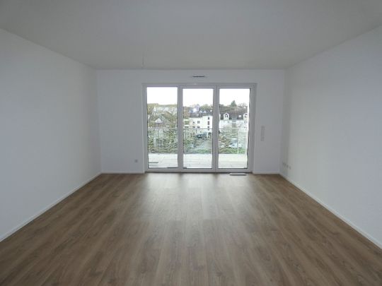 Neubau/Erstbezug: Modern geschnittene 3-Zimmer-Wohnung mit traumhaftem Ausblick - Photo 1