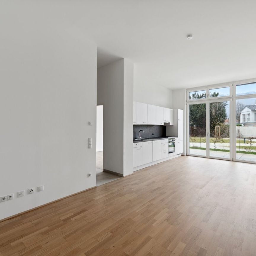 Moderne 2-Zimmer-Wohnung mit Eigengarten und Terrasse! - Foto 1