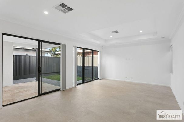 BRAND NEW MODERN HOME WITH QUALITY FINISHES! - Photo 1