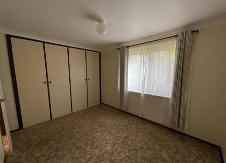 Well-Maintained Two-Storey Unit in Secure, Central Complex - Photo 2