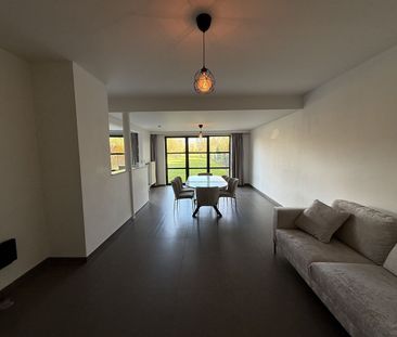 Gelijkvloers appartement met ruime tuin - Foto 1