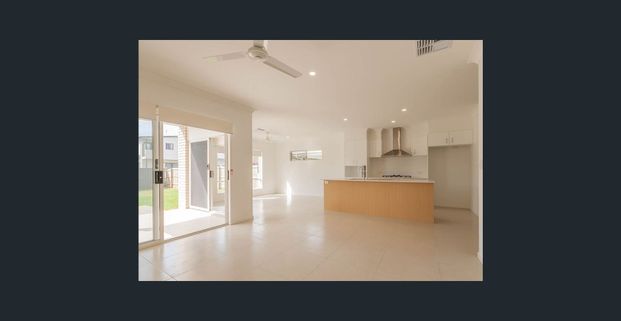 Four-Bedroom Luxury Home in Wynnum - Photo 1