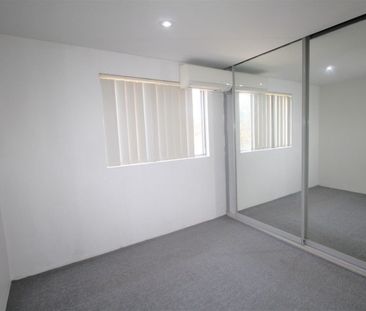 TIDY TWO BEDROOM UNIT - Photo 2