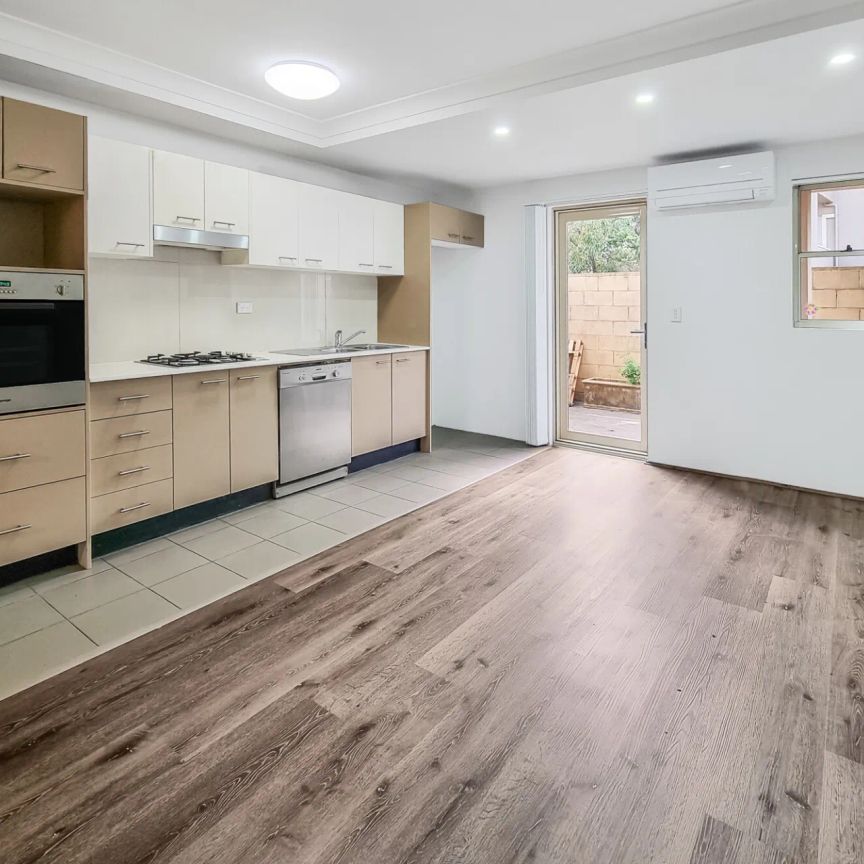 RENOVATED 3 BEDROOM DOUBLE STOREY APARTMENT WITH NEW FLOORING THROUGH-OUT - Photo 1