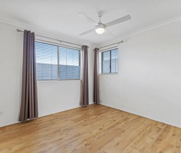 Conveniently located unit with low ongoing cost of living. - Photo 1