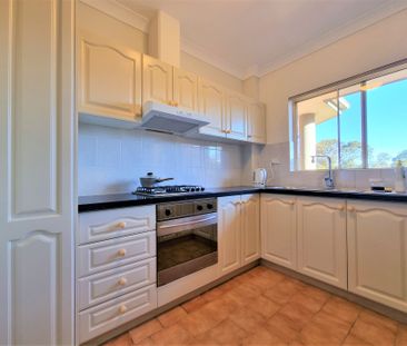 SECURITY AND SPACIOUS TWO BEDROOM UNIT - UPGRADED - Photo 5