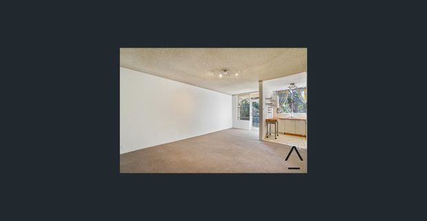 Newly Renovated 2 Bedder in Good Location - Photo 1