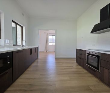 Fully Renovated Home with Stunning City Views - Photo 5