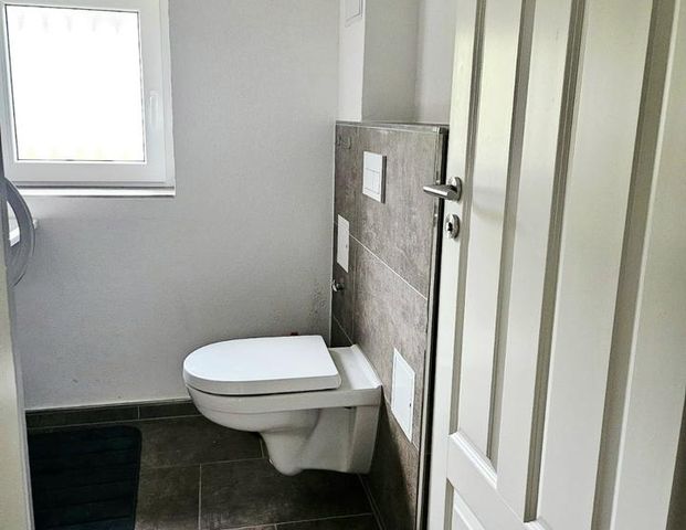 Moderne 1-Zimmer-Etagenwohnung in zentraler Lage von Olpe-Sondern - Foto 1