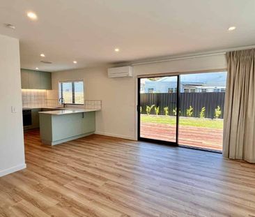 Modern 2-Bedroom Home with Sunny Deck and Private Lawn - Photo 2