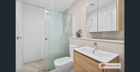 Stylish Near-New Apartment in the Heart of Schofields - Photo 4