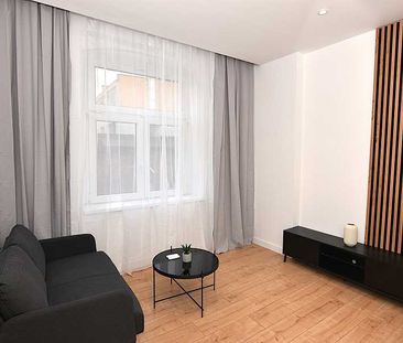 Nowocześnie odnowiona kawalerka w Centrum - Photo 1