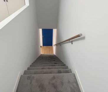 Spacious Three-Level Townhouse with Workshop & Dual Outdoor Living - Photo 5