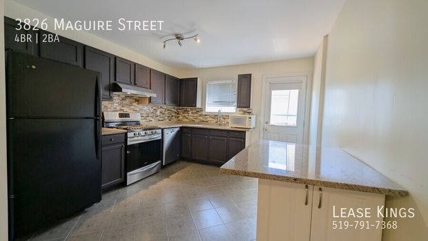 PRIME SOUTH WINDSOR RAISED RANCH HOME - Photo 1