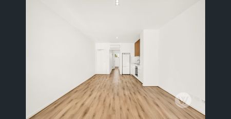 Sleek and Stylish City Apartment - Photo 3