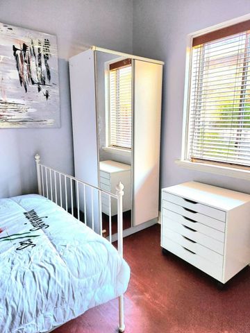 3BR Home in Caulfield South with Air-Conditioning & Private Backyard Oasis - Photo 3