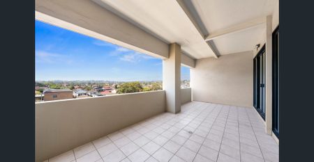 TWO BEDROOM APARTMENT CONVENIENTLY LOCATED WITH GREAT AREA VIEWS - Photo 5