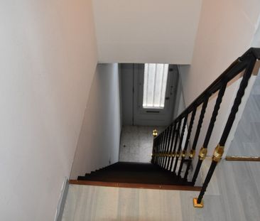 Opgefriste rijwoning met stadskoertje - Photo 1