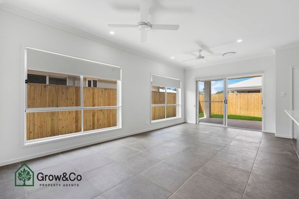 BRAND NEW 4 BED HOME - GREAT FULLY FENCED BACKYARD - Photo 1