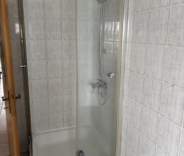 große DG-Wohnung mit Gartenanteil - Photo 4