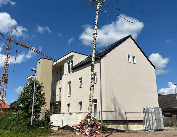 Ein architektonisches Highlight: Wohnen im historischen Schulgebäude mit modernster Technik! - Photo 1