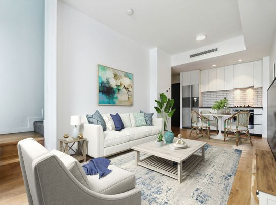 Modern Elegance and Stylish One-Bedroom Townhouse style Apartment - Photo 1