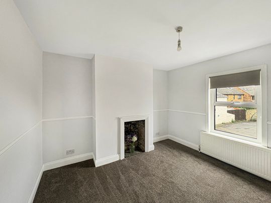 Situated along the High Street, this charming 3 bedroom character home offers a private entrance via a side passage that also provides access to the attractive south/west-facing garden. - Photo 1