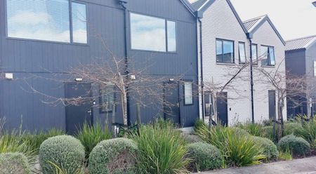 Stylish 2-Bedroom Home with Modern Comforts & Private Outdoor Spaces - Photo 2