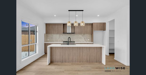 Spacious Family Home with Modern Features - Photo 1