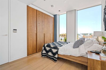 A top floor two bedroom apartment with stunning views in the Barts Square development. - Photo 4