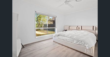 Modern Family Retreat Backing Onto Tranquil Parklands - Photo 4