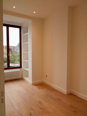 Ruim appartement met 2 slaapkamers aan de Markt in Lokeren! - Photo 4