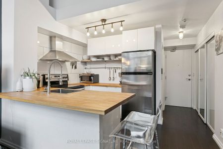 Mystic Pointe Lofts , #111 - Photo 2