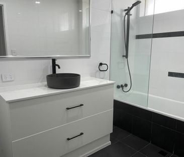 Renovated Unit with Ocean Glimpses - Photo 6