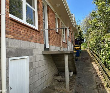 Charming 2BR Unit with Garden & Deck! - Photo 3