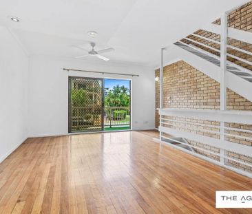 Convenient Three-Level Unit in Prime Location - Photo 1