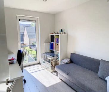 Halfopen bebouwing met tuin in rustige woonwijk te Borgloon - Photo 1